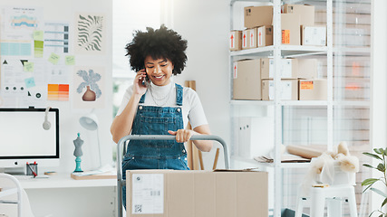 Image showing Small business, woman phone call and box logistics on trolley for delivery, customer orders and product stock in startup. Black female entrepreneur, mobile talking and shipping cargo package service