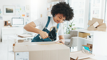 Image showing Woman packing box, package and cargo with tape for delivery, sale and shipping in workshop, startup store and creative studio. Female small business owner prepare product, order and service logistics