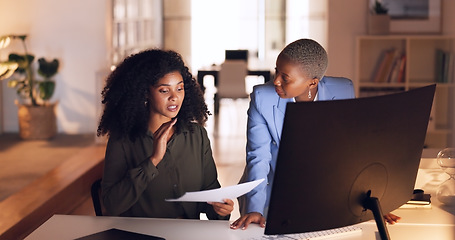 Image showing Documents, collaboration and talking with a business woman team working in their office at night. Teamwork, conversation and training with a female employee explaining a report to a colleague