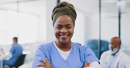 Image showing Black woman, healthcare and hospital nurse with arms crossed of medical service, management or surgery. Portrait, smile or happy doctor, surgeon or therapist consulting in clinic, trust or motivation