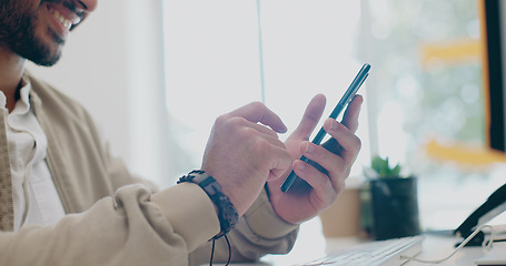 Image showing Creative businessman, hands and phone in zoom for social media, communication or browsing at office desk. Happy male employee typing in online search and smile for text, post or startup on smartphone