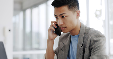 Image showing Phone call, email and Asian man planning on a laptop, financial communication and accounting discussion on a phone. Strategy, conversation and accountant reading on a pc while speaking on a mobile