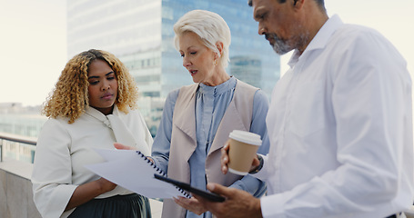 Image showing Leadership, senior or business people networking on rooftop in city talking or planning a digital marketing strategy. Teamwork, CEO or employees in meeting speaking of kpi goals or sales growth ideas