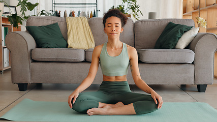 Image showing Yoga, meditation and happy woman on floor for home workout, exercise and training for mindfulness, health and wellness of body and mind. Calm female in lounge to meditate, pilates and zen breathing