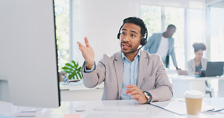 Image showing Customer service, call center and man consulting in office workplace. Crm, customer support and telemarketing worker, sales agent or happy male consultant talking, networking or communication at desk