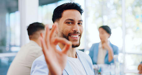 Image showing Perfect, happy and portrait of a businessman with a hand in a meeting for success, planning and ok. Smile, seminar and face of an employee with an emoji sign for a deal, agreement or support