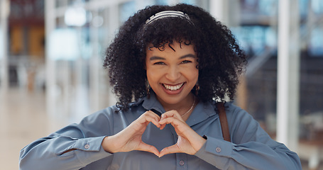 Image showing Business woman, face or heart sign in modern office, marketing customer support or client branding care. Portrait, happy smile or love hands gesture for creative designer, Brazil worker and employee