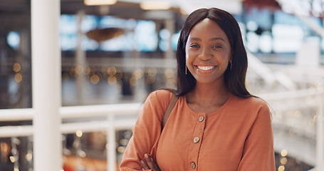 Image showing Black woman, happy with face and success in business, employee at modern office in Cape Town and positive mindset. Professional portrait, African and workplace mockup with laughing and work happiness