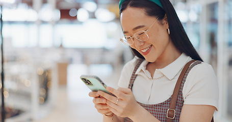 Image showing Digital marketing woman, smile and phone in workplace, social network or chat at communication startup. Asian corporate executive, smartphone or happy for app, web or social media marketing in Tokyo