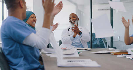 Image showing Doctors, applause and high five with success and paper confetti, celebrate win in health and cheers for team building. Happy, medical innovation win and target goal with motivation and diversity.