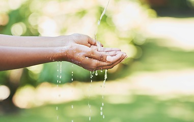 Image showing Outdoor, hands and water for cleaning, hydration and hygiene for care, splash and wellness. Nature, hand and aqua for washing, prevent germs and remove dirt for freshness, environment and outside