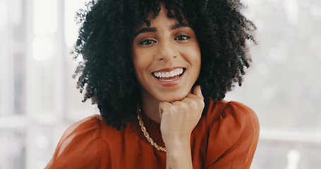 Image showing Face, vision and mindset with a business black woman sitting at a desk with her hand on her chin. Portrait, happy and smile with a female employee thinking about future growth or company development