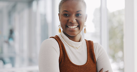 Image showing Face, leadership and black woman with arms crossed in office ready for goals or targets. Ceo, boss or happy female entrepreneur from Nigeria with vision, mission and laughing for success in workplace