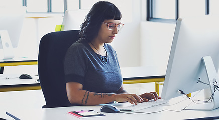 Image showing Computer, startup or focus woman in office typing for cybersecurity, app coding or networking. Research, desk or employee working on tech for software code, programming or SEO website server review