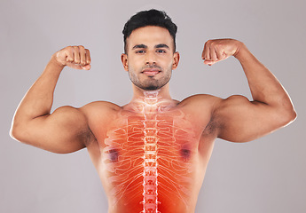 Image showing X ray, strong and portrait of a man with muscle isolated on a grey studio background. Spine, anatomy and person showing results from strength workout, training and fitness with power on a backdrop