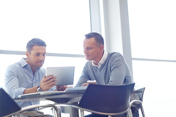 Image showing Business meeting, corporate or business people with tablet for invest strategy, finance growth or financial review. Teamwork in office building planning, data analysis or economy data research search