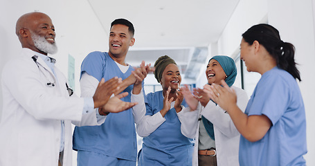 Image showing Applause, healthcare teamwork and hospital success, collaboration or motivation. Diversity, happy doctors and nurses clapping hands in commitment, trust and support of medical goals, deal or wellness