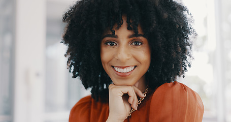 Image showing Face, vision and mindset with a business black woman sitting at a desk with her hand on her chin. Portrait, happy and smile with a female employee thinking about future growth or company development