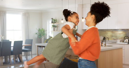 Image showing Mother and daughter dancing, celebration and doing fun dance moving to love song in apartment with happy sisters, nanny or home mom. Woman, child care and black family for radio happiness energy time