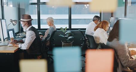 Image showing Digital marketing, computer or employees in a digital agency office building with focus, productivity or kpi goals. Website, men and women working on sales growth mission or SEO strategy on internet