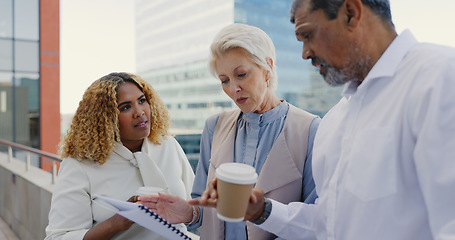 Image showing Leadership, senior or business people networking on rooftop in city talking or planning a digital marketing strategy. Teamwork, CEO or employees in meeting speaking of kpi goals or sales growth ideas