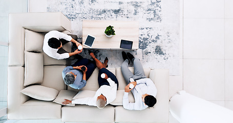 Image showing Business meeting, coffee and sofa for planning, b2b collaboration and brainstorming ideas above. Lobby, lounge and technology of corporate worker in teamwork, partnership and workspace coffee break