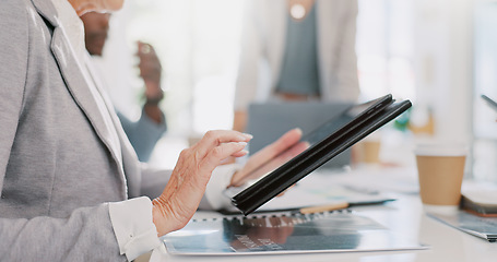 Image showing Hands, tablet and senior woman in meeting researching, internet browsing or networking. Technology, planning or elderly female employee typing on touchscreen with business people in company workplace