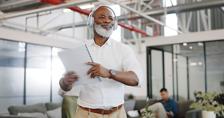 Image showing Dance, music and headphones, senior black man at work with energy and positive mindset, happiness and motivation in the workplace. Dancing, radio and fun in workspace, excited for work or retirement.