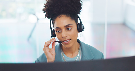 Image showing Contact us, crm or black woman in a call center consulting, communication or speaking of loan advice at office desk. Telemarketing, customer support or African agent helping a life insurance client