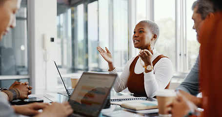 Image showing Meeting, discussion and professional black woman talking to her colleagues in the office conference room. Teamwork, presentation and African female employee in conversation with her team for project.