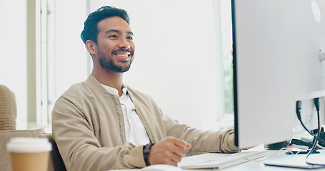 Image showing Internet, search and businessman on a computer for planning, creative and happy in office. Male, entrepreneur and handsome, corporate and employee typing, browsing and email, smile and satisfied