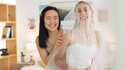 Image showing Wedding veil of woman with friends help in dressing room. Happy people, women love and bridesmaid support or helping bride with fitting designer fabric on her head for beauty, marriage and happiness