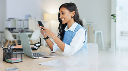 Image showing Young businesswoman talking on her phone to a client in an office. Trendy marketing professional on scheduled time, using the online app for networking. Entrepreneur staying connected in a workplace