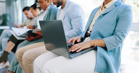 Image showing Hands, laptop or waiting and a business woman in line for her hiring interview with human resources. Computer, resume and recruitment with a female candidate sitting in a row for a company vacancy