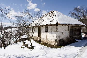 Image showing traditional Serbian farm house in winter