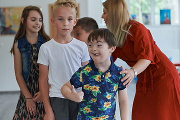 Image showing Preschool children wait in line for new and interesting games. Selective focus