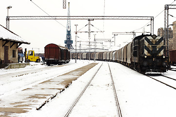 Image showing trains in freight yard winter