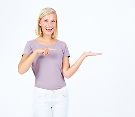 Image showing Announcement, portrait or woman with mockup for marketing, branding or advertising space on studio background. Discount deal, product placement or happy girls hands showing sales offer in promotion