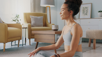 Image showing Meditation, pilates and home yoga for black woman working on spiritual chakra peace, freedom of the mind and zen mindset. Body health, wellness lifestyle and relax girl training on living room floor