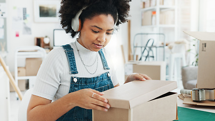 Image showing Black woman, music headphones and dance in office, ecommerce shipping logistics company or creative e commerce startup. Smile, happy and excited retail worker with dropshipping product delivery boxes