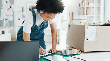 Image showing Delivery, ecommerce and shipping with woman writing logistics information from laptop for online shopping, product or checklist. Storage, stock and cargo with employee in retail warehouse factory