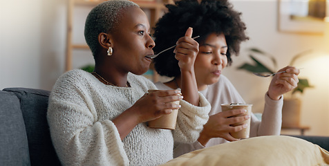 Image showing Relax, ice cream and women friends eating together on the weekend to bond with frozen dairy treats. Black people in girl friendship enjoy sweet dessert break to relax while resting in home.