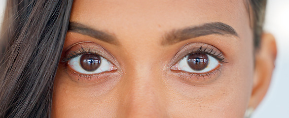 Image showing Confident, happy and beautiful woman face, looking excited and free, proud female cheerful about beauty procedure. Closeup portrait of female smiling after getting natural looking eyelash extensions