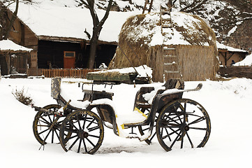 Image showing old horse drawn carriage in the snow