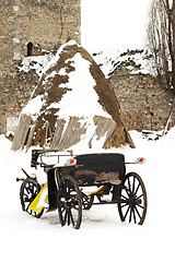 Image showing old horse drawn carriage in the snow