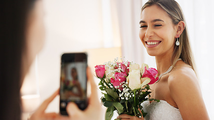 Image showing Bride, bridesmaid and wedding picture with phone with flowers or bouquet, fashion dress and an excited smile for social media. Happy woman and friend with mobile smartphone before a marriage ceremony