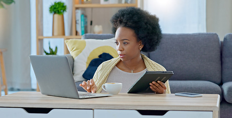 Image showing Women relaxed with coffee, sitting on the floor, back against the sofa reading email, checking social media or streaming movie at home. Weekend, woman on couch with computer and a coffee break in liv