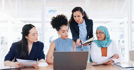 Image showing Business women, laptop and collaboration in office for marketing management, leader innovation or strategy research. Team meeting, employee support and tech manager or leadership idea discussion