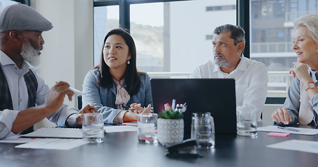 Image showing Business people, laptop or documents in diversity meeting for company financial planning, investment strategy or insurance ideas. Smile, happy or talking finance workers with fintech technology paper