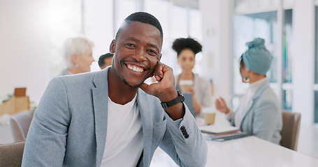 Image showing Meeting, office and face of a professional black man sitting at a table with a corporate team. Happy, smile and portrait of African businessman working on company project with colleagues in workplace